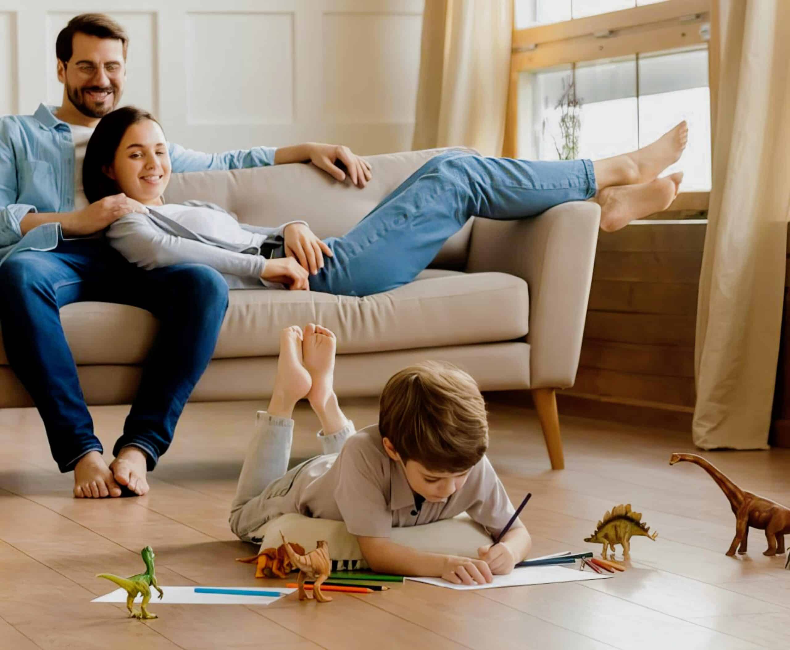 Family relaxing in room with wooden floor